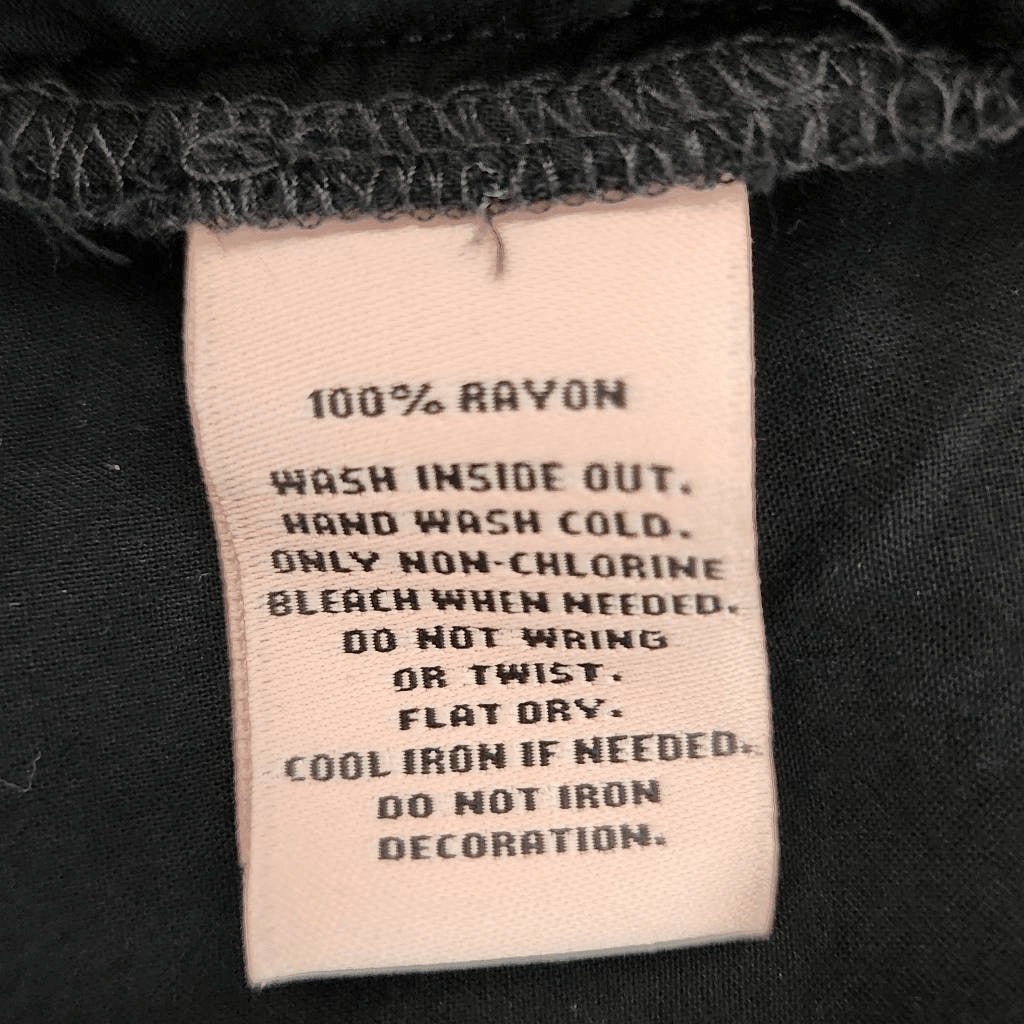 Juicy Couture Black Blouse with Beaded Neckline Size Small Black V-Neck Blouse