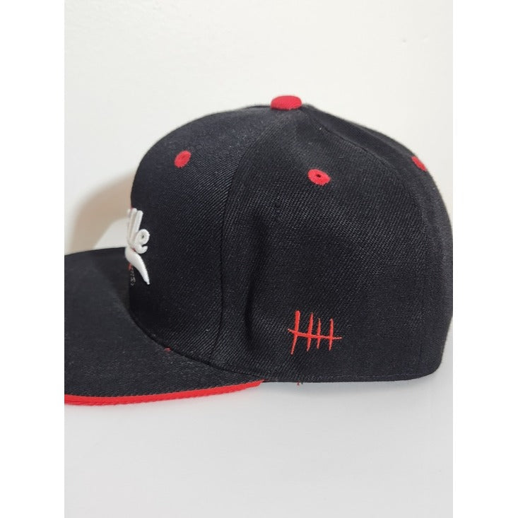 The Walking Dead Supply Drop Black and Red Lucille Flat Bill Hat Adjustable